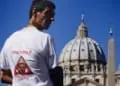 Francesco Zanardi, who claims he was sexually abused by a priest, arrives at St. Peter Square at the Vatican Tuesday, Oct. 11, 2011. Two Italians who say they were sexually abused by priests have completed a 340-mile (550-kilometer) protest march to the Vatican and demanded an independent inquiry. The journey from Savona in northern Italy to St. Peter's Square took 19 days. Francesco Zanardi and Alberto Sala arrived in Vatican City on Tuesday, where they tried unsuccessfully to obtain an audience with the pope. They handed over a letter demanding the Italian bishops' conference open the inquiry into priestly sex abuse and draft norms requiring pedophiles be defrocked "without exception." They want any bishop who leaves abusers in ministry to be removed. The jersey carries a play on the words "priest" and "pedophiles" over the writing "Keep out of the reach of children". (AP Photo/Angelo Carconi)