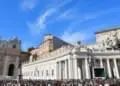 Pope Francis (Top R at window) delivers his message to the faithful during the weekly Angelus prayer on November 11, 2018 at St. Peter's square in the Vatican. (Photo by Alberto PIZZOLI / AFP)