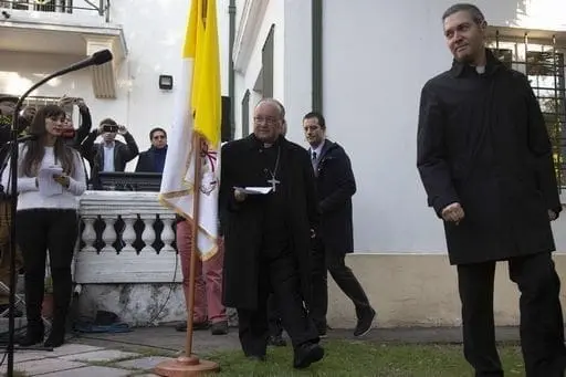 Archbishop of Malta Charles Scicluna (L) and Spanish priest Jordi Bertomeu (R) arrive at a press conference at the Apostolic Nunciature in Santiago on June 12, 2018.
Scicluna, the Vatican's top abuse investigator, and another papal envoy Jordi Bertomeu arrived in Chile on Tuesday. The two officials are to travel to Osorno, the Catholic diocese that was led by controversial bishop Juan Barros, one of three bishops whose resignation Francis accepted on Monday, following a child sex abuse scandal which has come to haunt his papacy.
 / AFP PHOTO / CLAUDIO REYES