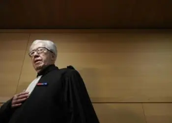 epa07419139 Cardinale Barbarin's lawyer Andre Soulier arrives at the court for the verdict in the trial of Cardinal Philippe Barbarin, in Lyon, France, 07 March 2019. Cardinal Philippe Barbarin was convicted of helping covering up sex abuse and handed a six-month suspended jail term on 07 March 2019. EPA/ALEX MARTIN