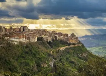 the sun breaking through the clouds above Enna - the highest city in Sicily