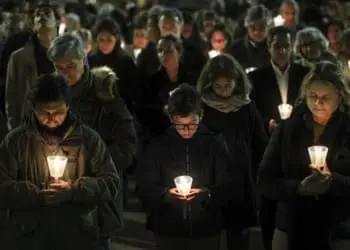 epa10484513 Hundreds of people take part in a silent prayer vigil for victims of sexual abuse in the Church, promoted by a group of Catholics near the Jeronimos Monastery in Lisbon, Portugal, 22 February 2023. The report of the Independent Commission for the Study of Sexual Abuses in the Church received 512 validated testimonies, which allowed the extrapolation of the existence of at least 4,815 victims, and 25 cases were sent to the Public Prosecutor's Office.  EPA/TIAGO PETINGA
