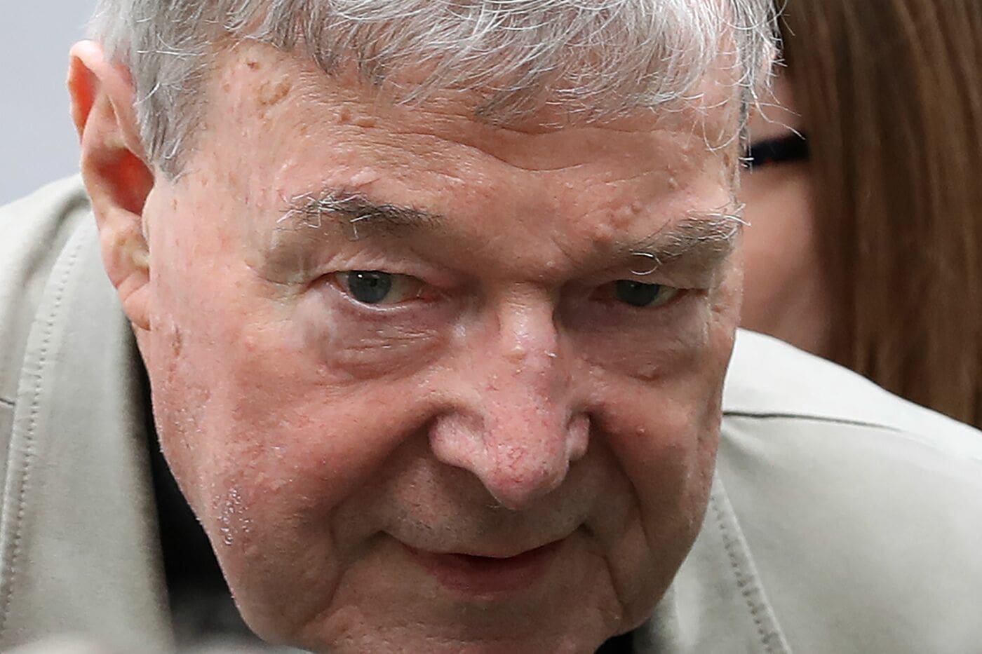 Cardinal George Pell walks from a car in Melbourne on February 26, 2019. - Australian Cardinal George Pell, who helped elect popes and ran the Vatican's finances, has been found guilty of sexually assaulting two choirboys, becoming the most senior Catholic cleric ever convicted of child sex crimes. (Photo by CON CHRONIS / AFP)