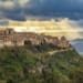 the sun breaking through the clouds above Enna - the highest city in Sicily